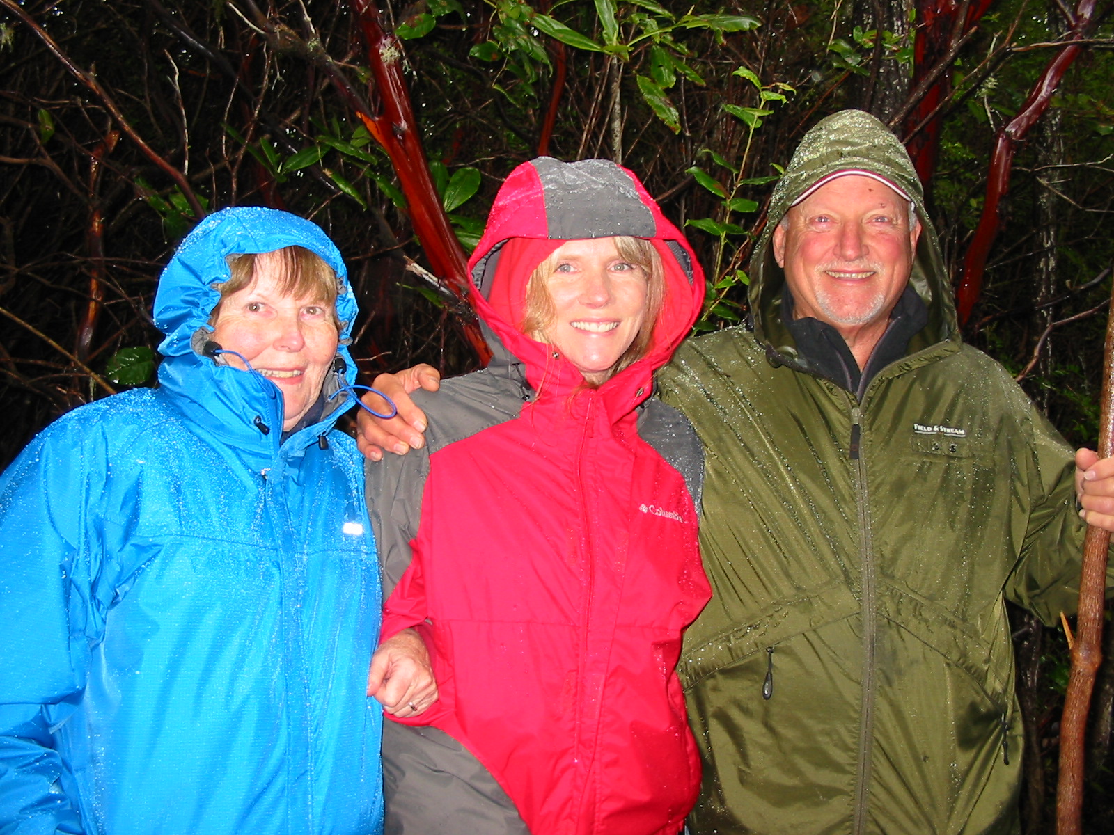 happy hikers in Oregon rain